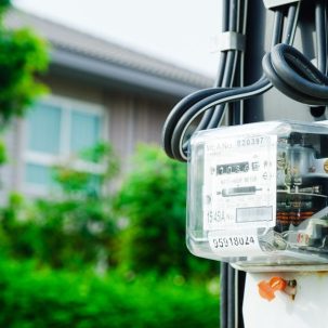 An electricity meter outside a house, to illustrate the value of energy flexibility